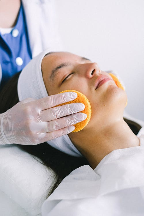 a woman getting a skincare treatment